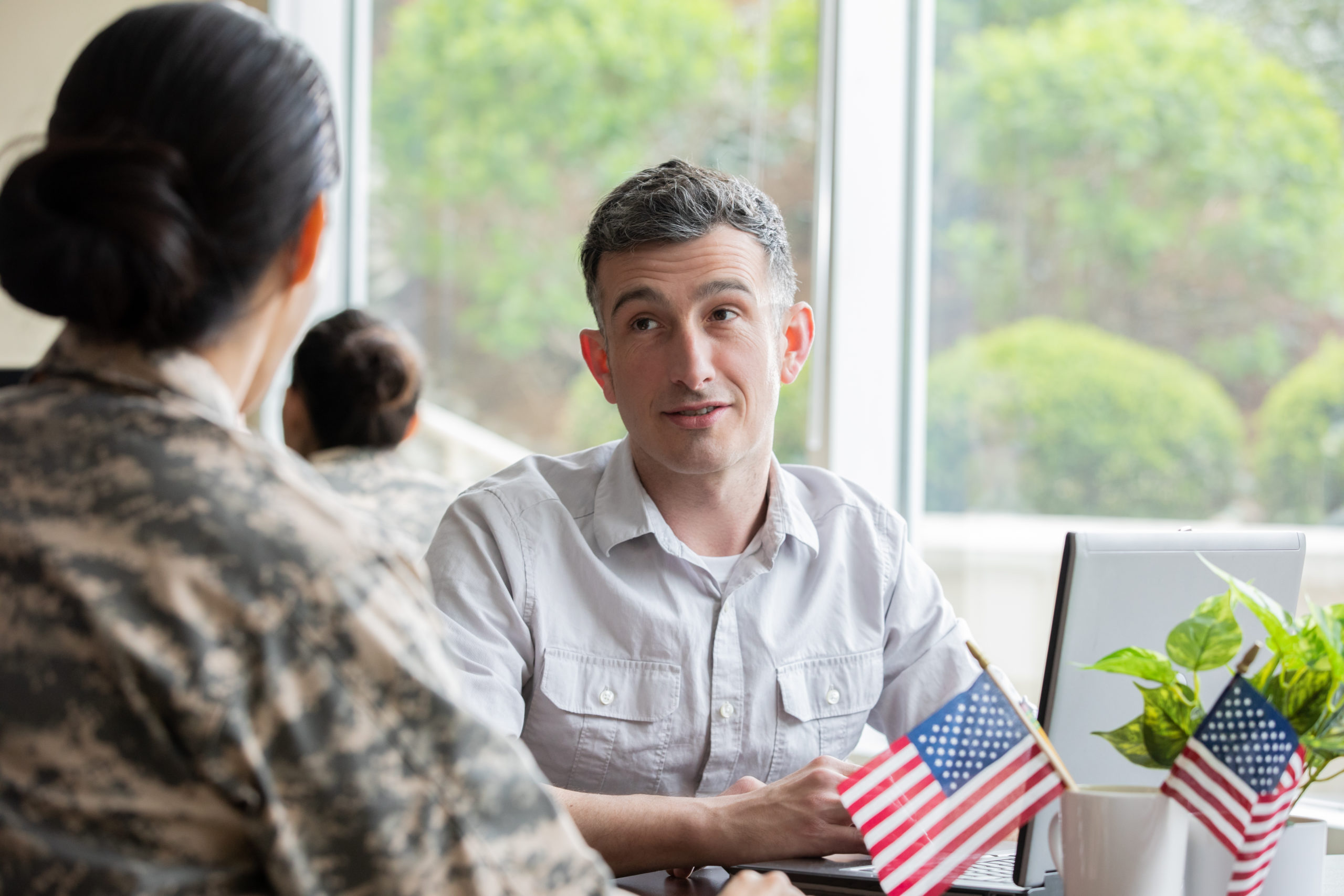 Real estate agent with female solider