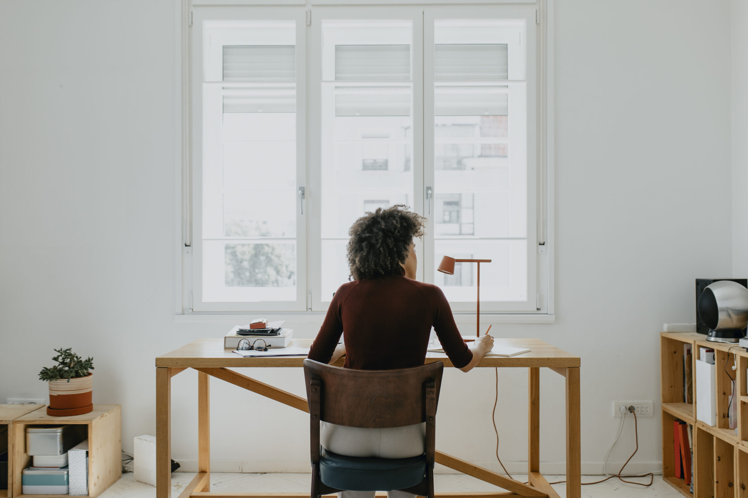female real estate woman working on computer