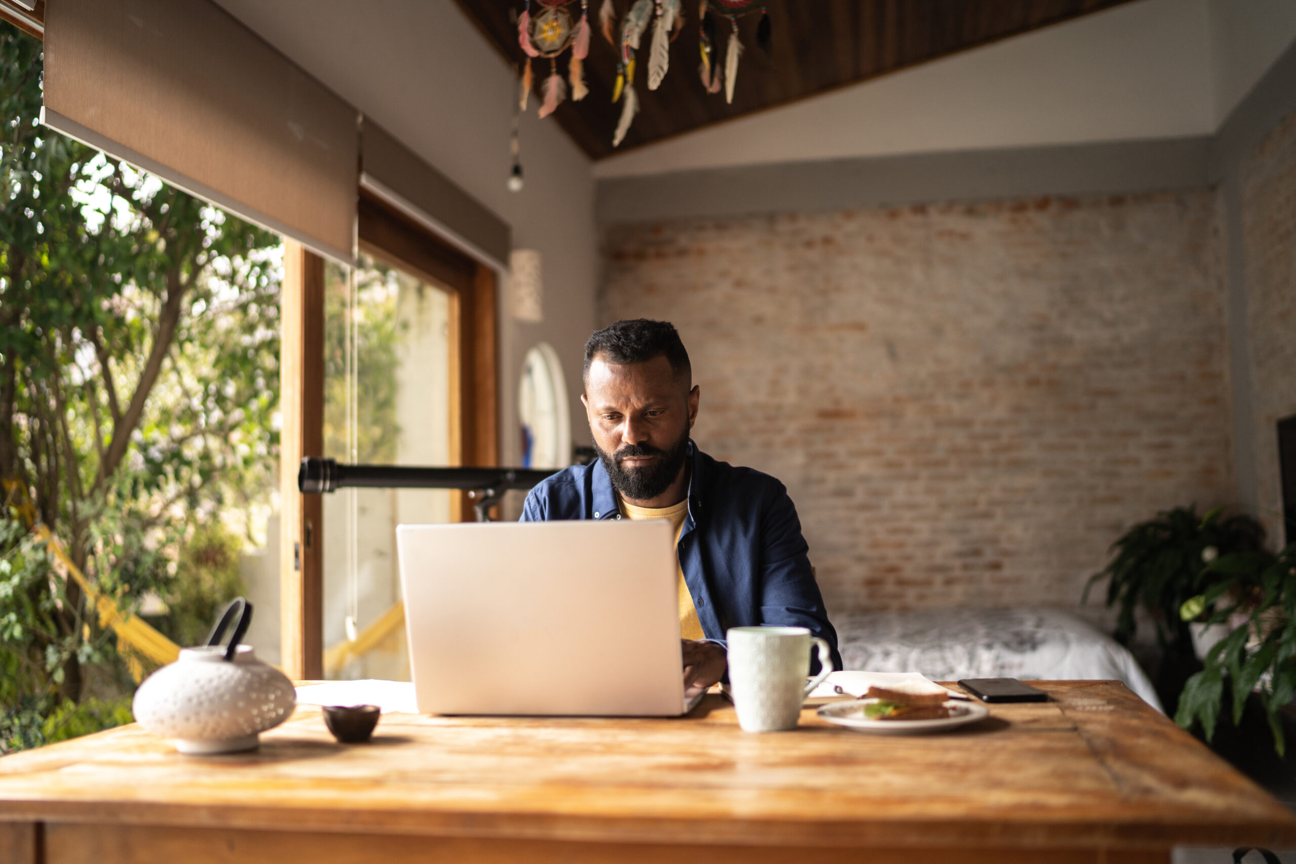 real estate agent working on laptop