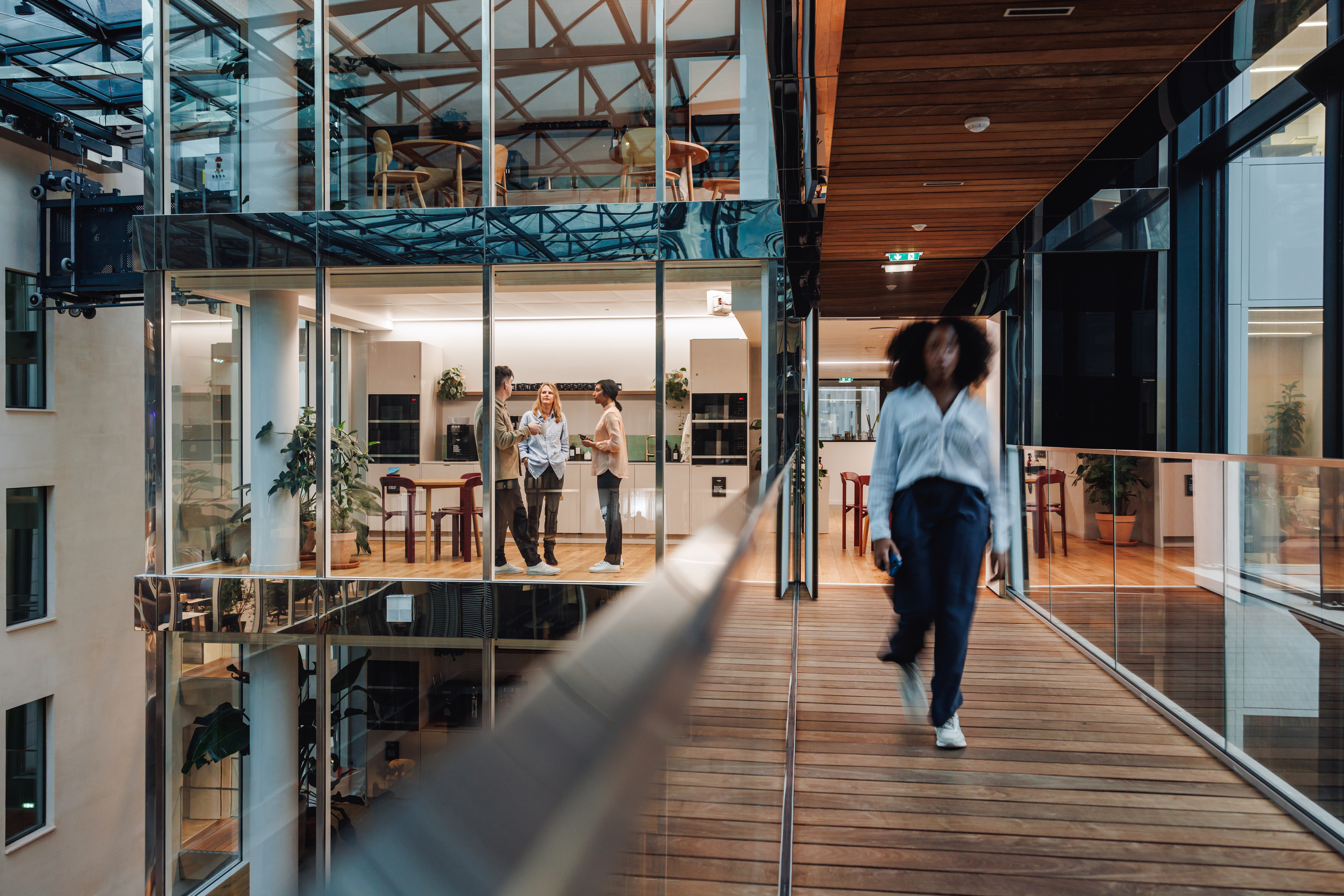 A real estate agent walking in an office