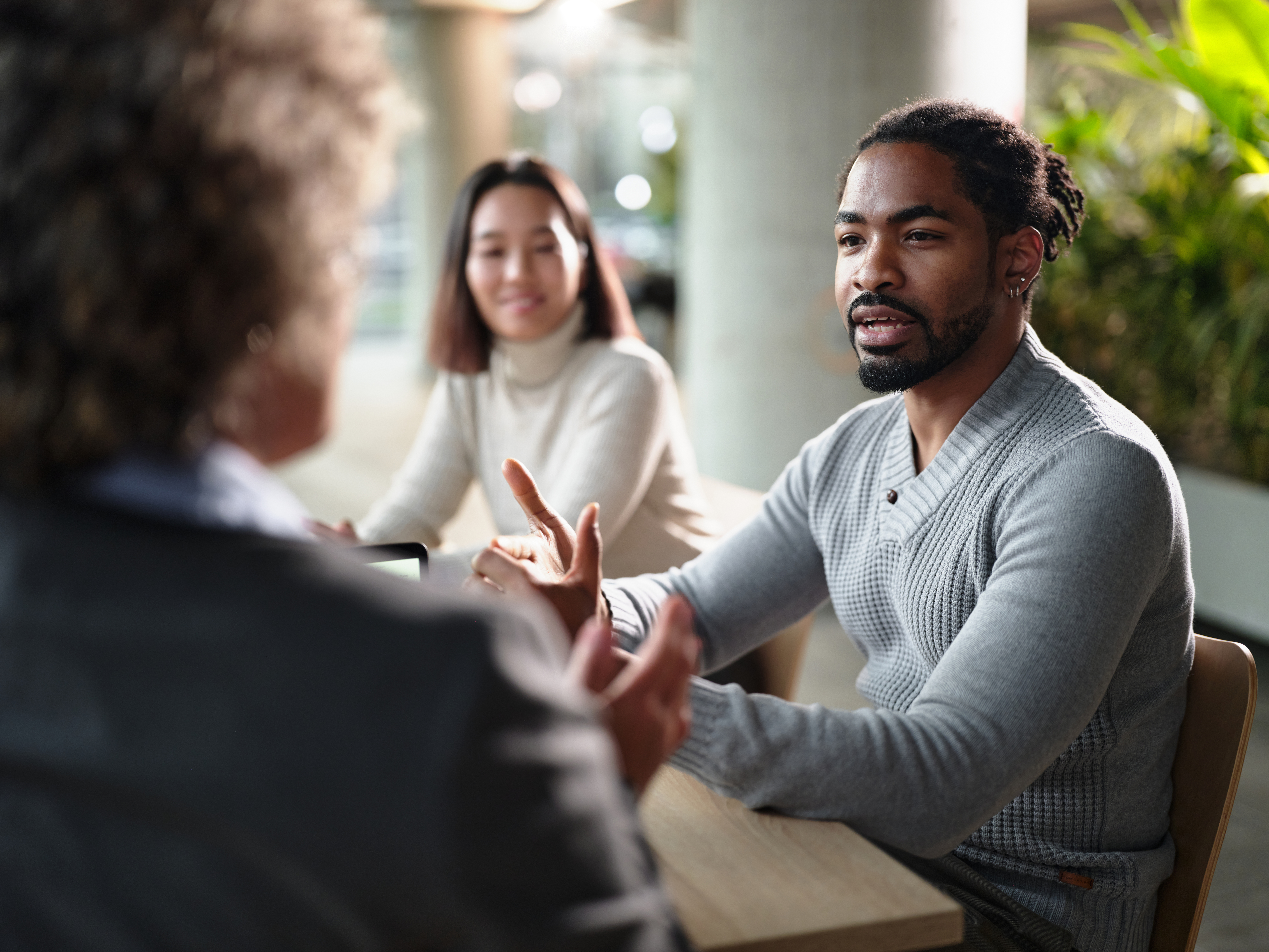 real estate agent meeting with home buyers